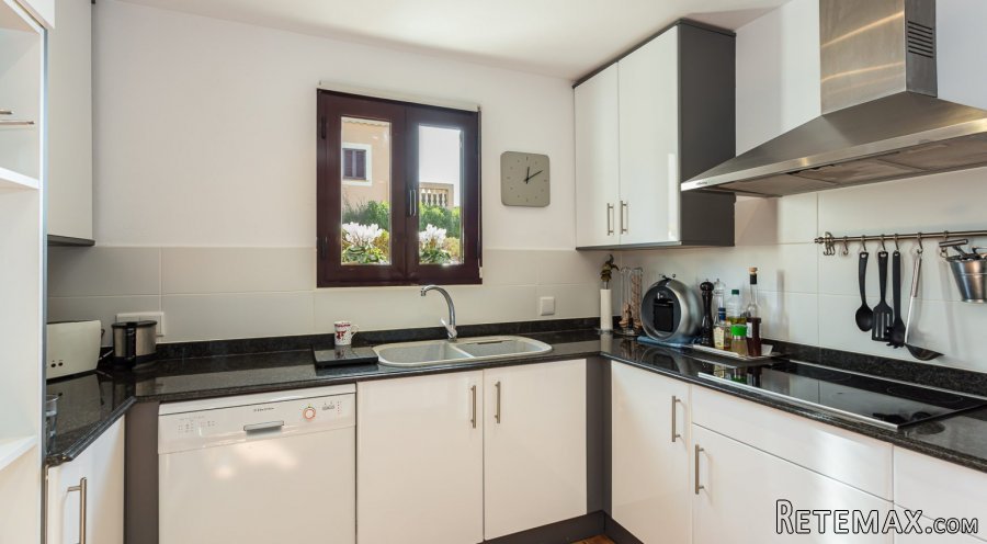 Spacious ground-floor apartment with garden is located in..
