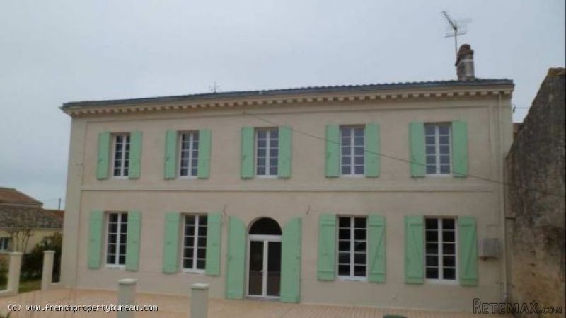 Restored stone house near fishing port..