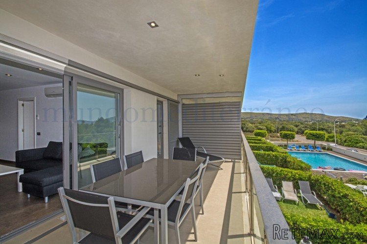 Contemporary apartment in a modern building with large..