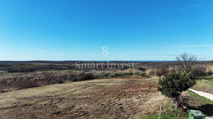 BUJE, građevinsko zemljište od 1302 m2 za kuću, pogled more - 2