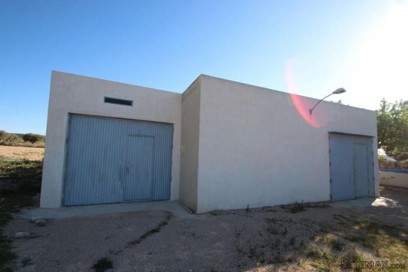Double garage with plot of land that..