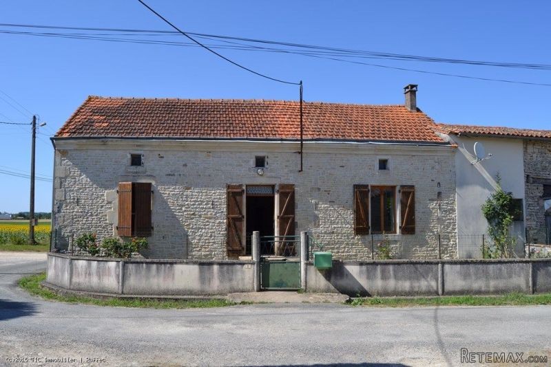 Pretty stone house with outbuildings
