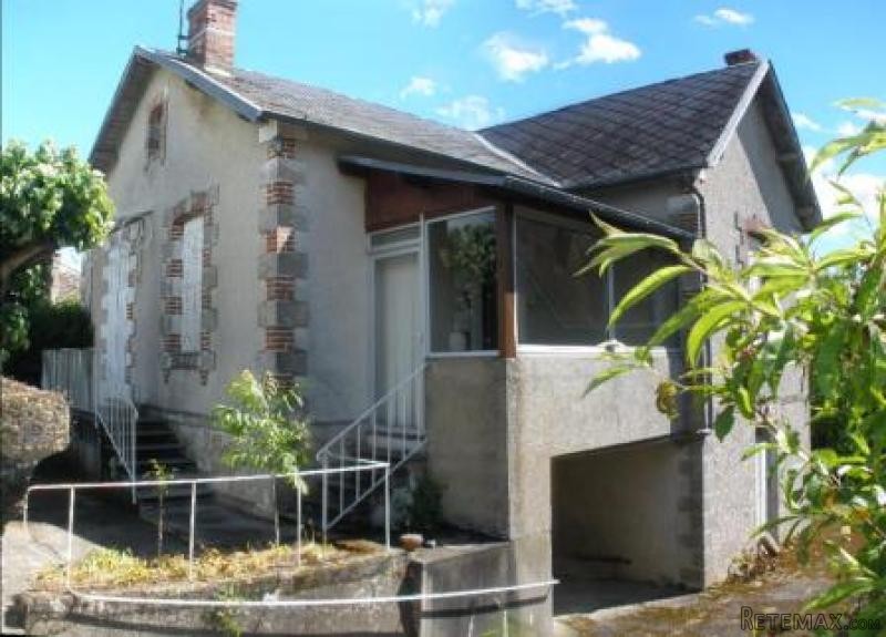 Interesting house on edge of town -..