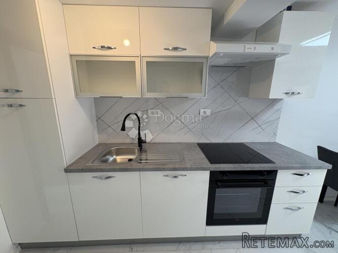 Kompletno renovirani apartman u prizemlju - 2