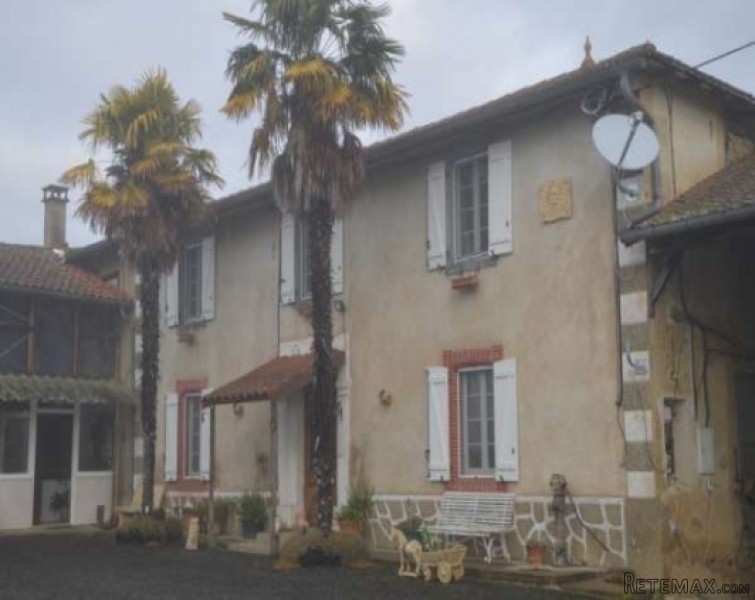 Hamlet farmhouse with outbuildings and..
