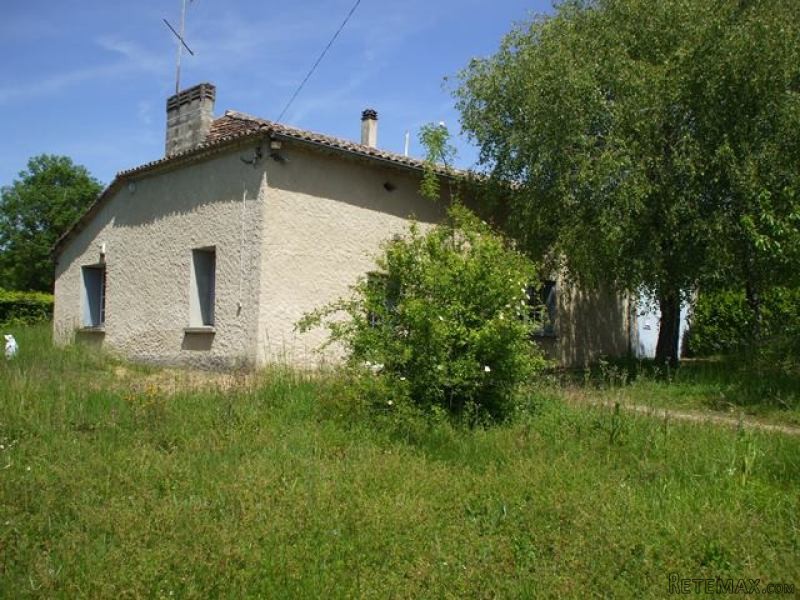 A Small Stone House With Outbuildings..