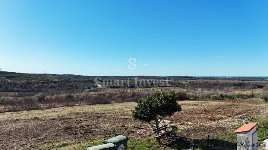 BUJE, građevinsko zemljište od 1302 m2 za kuću, pogled more