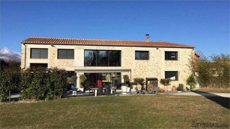 Unique Stone Property With Contemporary..