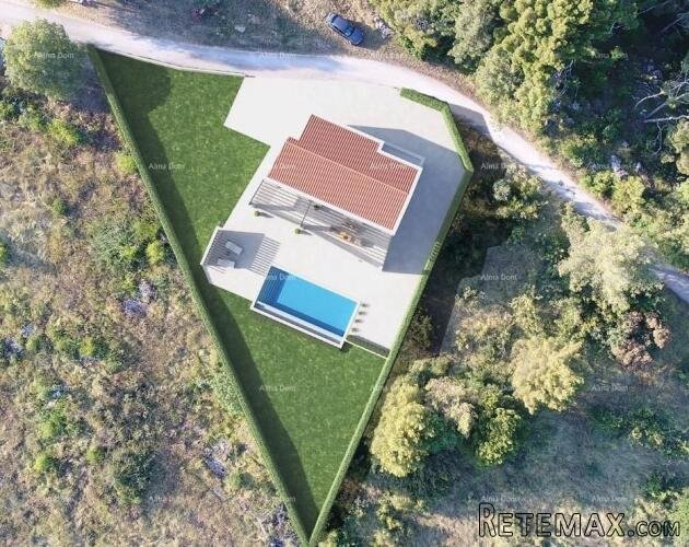 Na prodaju građevinsko zemljište s projektom kuće i bazenom..