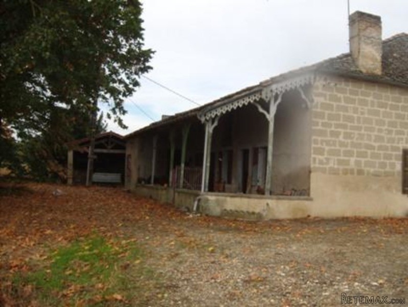 A Large Stone Farmhouse In Need Of..
