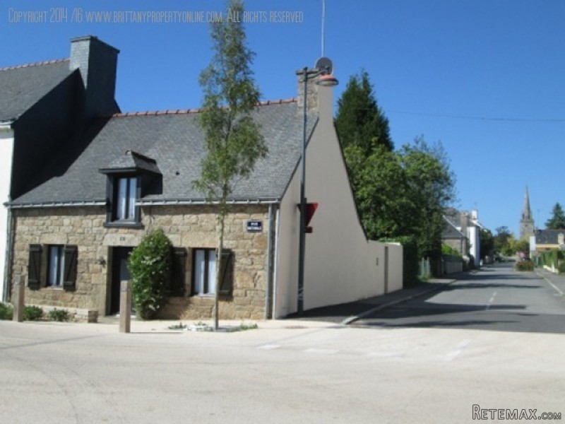 Character stone cottage in village...