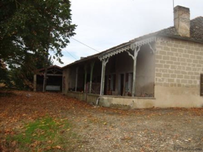 A Large Stone Farmhouse In Need Of..