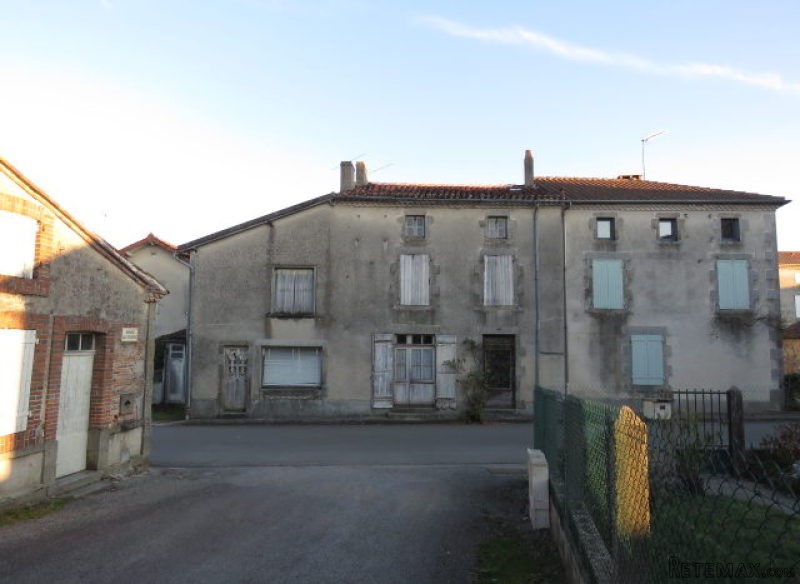 Big house with old butcher shop to..