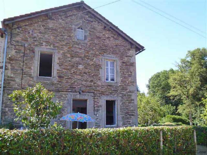 Stone House On The Edge Of A Small Town