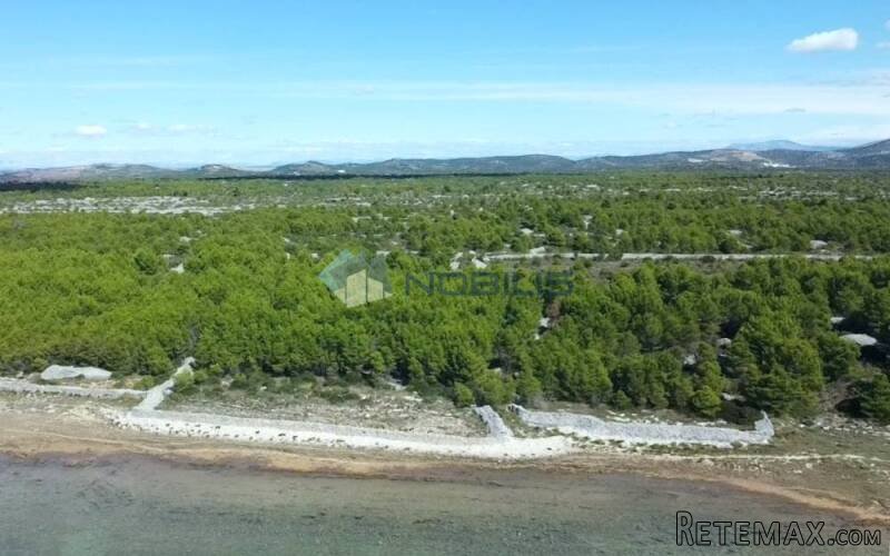 Šibenik, Jadrija, građevinsko zemljište 6026 m2 uz more