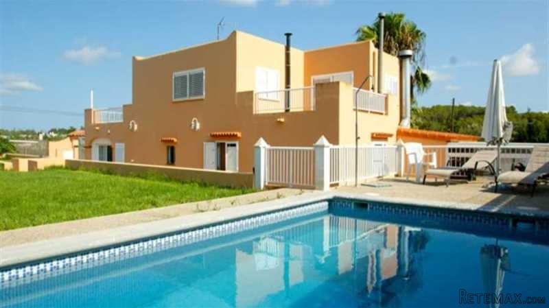 House with pool in the center of the..