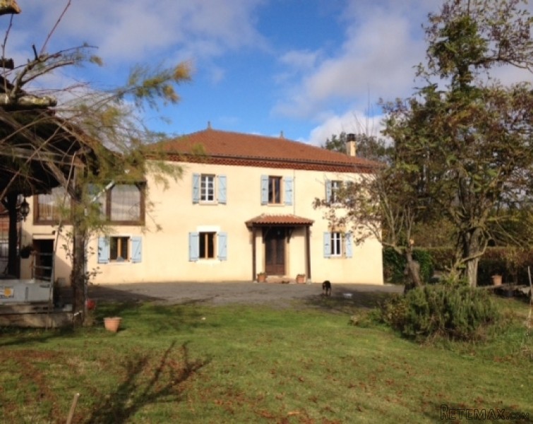 Old village farmhouse and barns with..