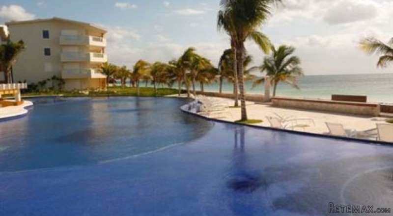DE LUXE BEACH FRONT CONDOMINIUM FOR..