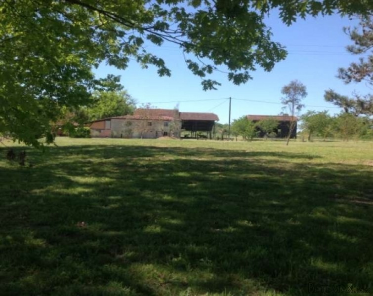 Pretty restored farmhouse with land..