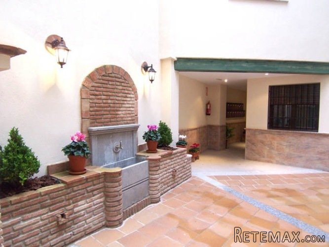 This two bedroom apartment in Monachil is moments from..