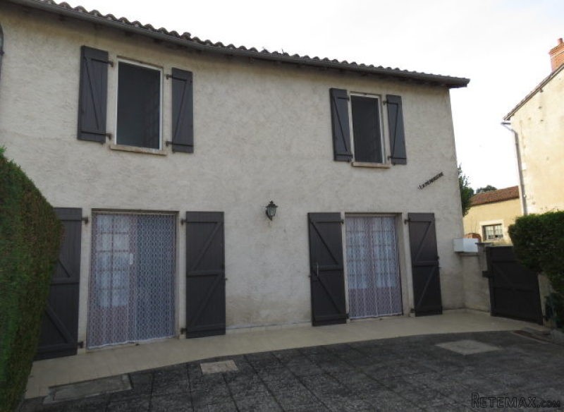Village house with large courtyard..