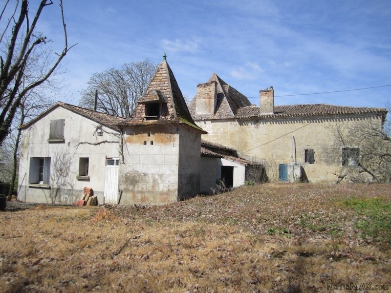 A Set Of Stone Buildings Including The..