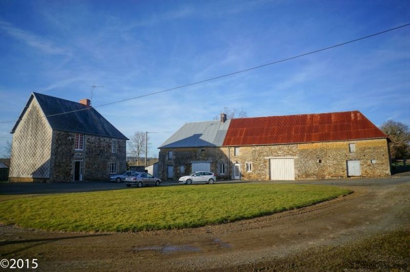 Group Of Stone Houses And Outbuildings..