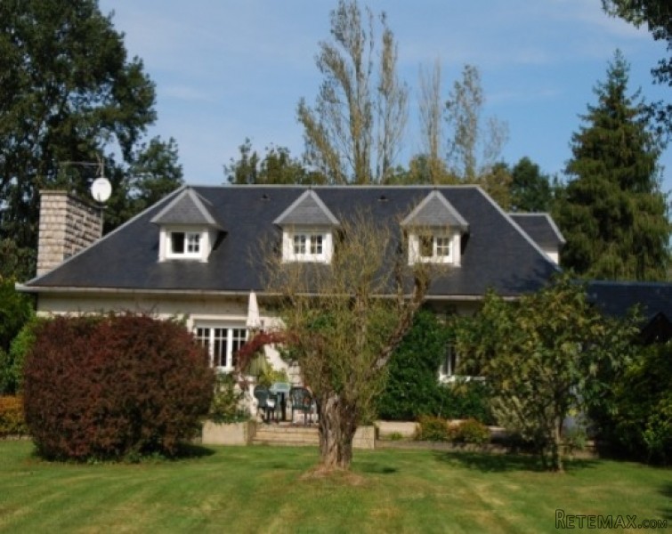 Parkland manor house with Pyrenees..