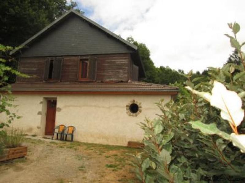 House with Outbuildings and Pond