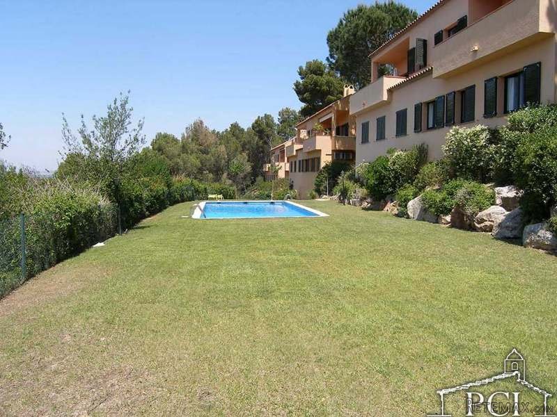 Semi detached house with communal pool.