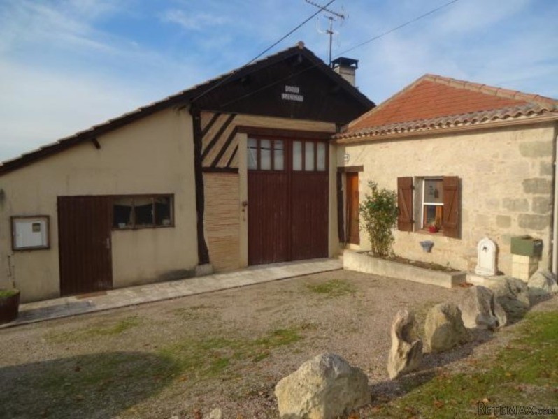 Pretty Stone And Half-Timbered House..