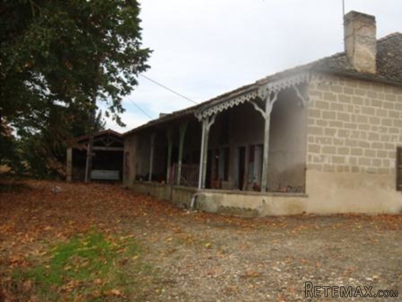A Large Stone Farmhouse In Need Of..