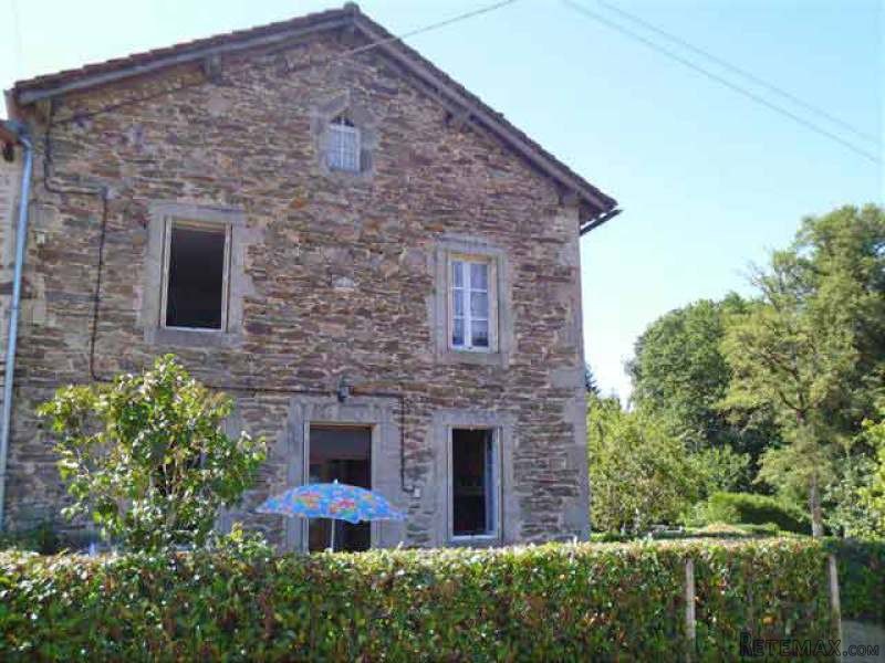 Stone House On The Edge Of A Small Town