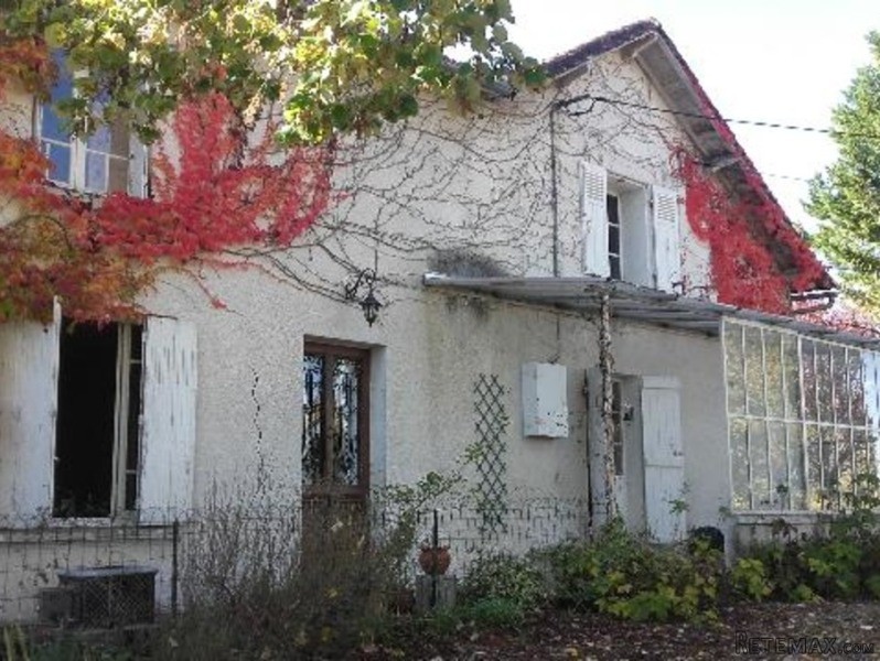 Pretty Stone Property Requiring Some..