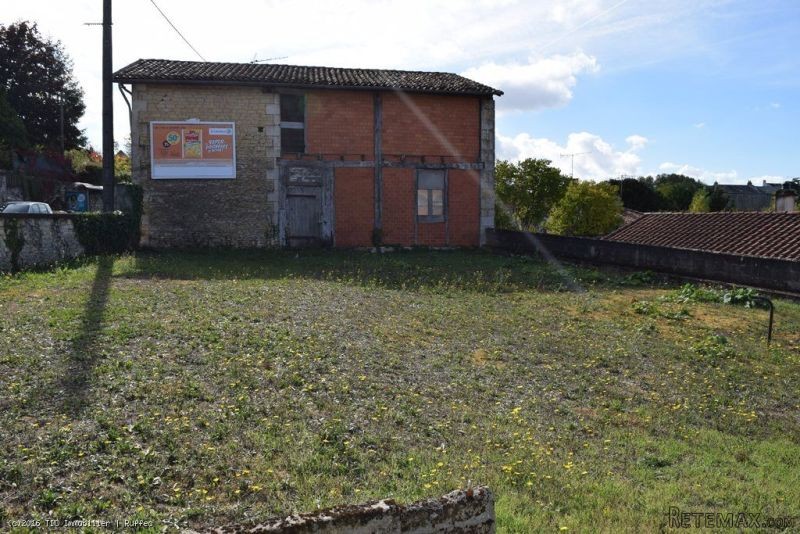 Town Centre Building Plot With Large..