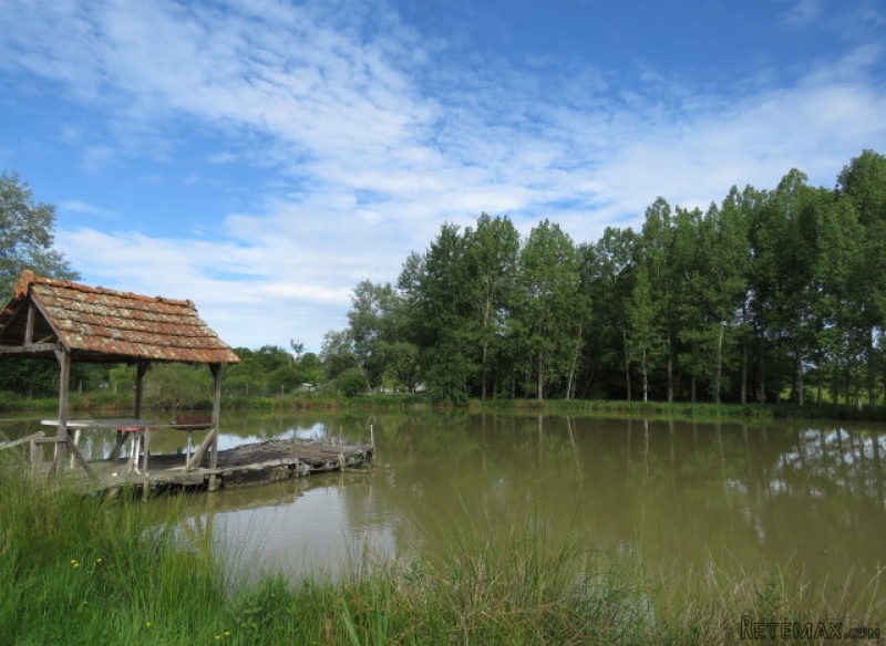 Lake of 1.5 acres in plot of 3.5 acres.