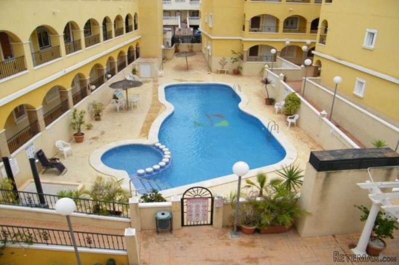 Apartment with Pool and Parking in..