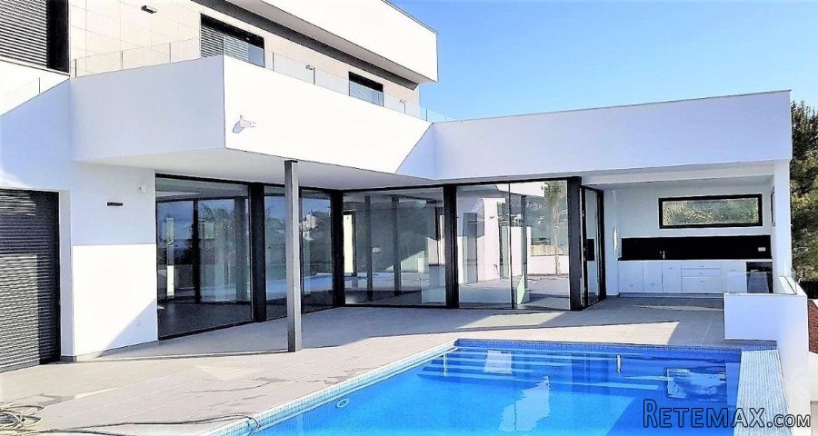 Recently finished modern villa on an elevated plot with..