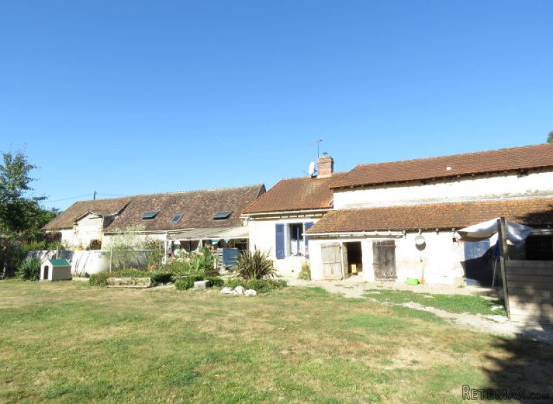 Big country house and barns with an..
