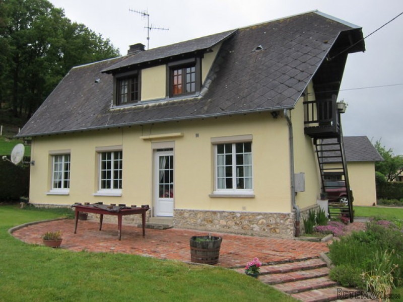 House on Wooded Plot Overlooking River..
