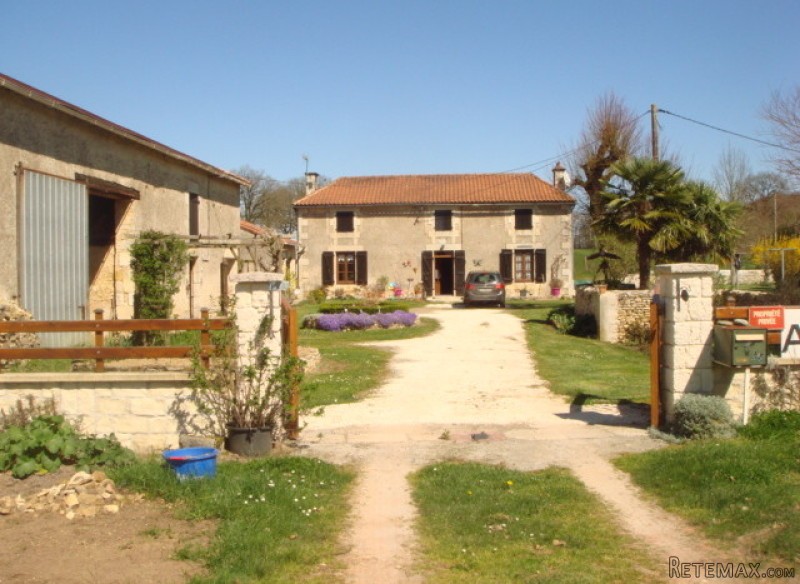 Farmhouse with big barn and large..