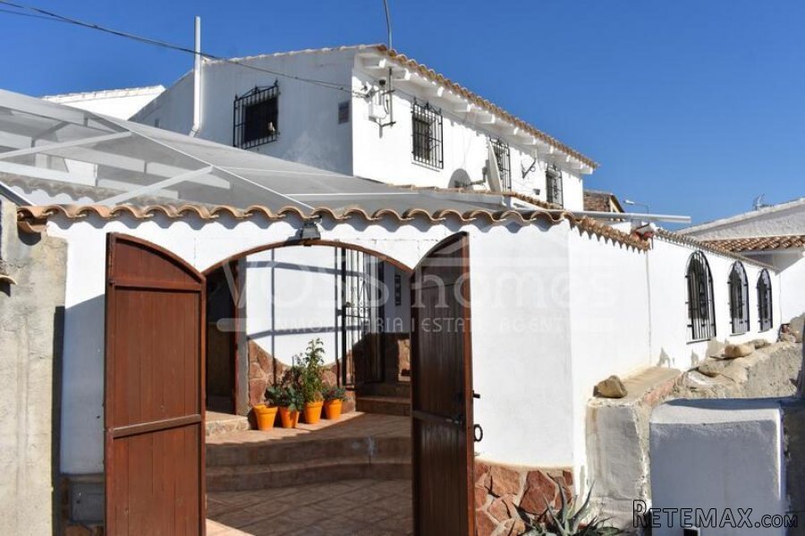 A very large & impressive village house. The main house has..
