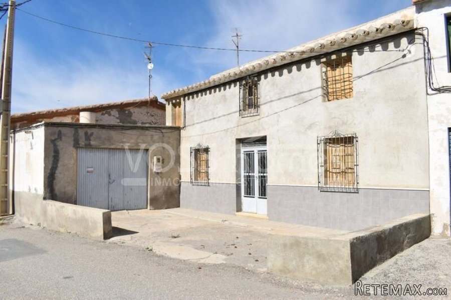 A lovely 2 storey village house to renovate currently with..