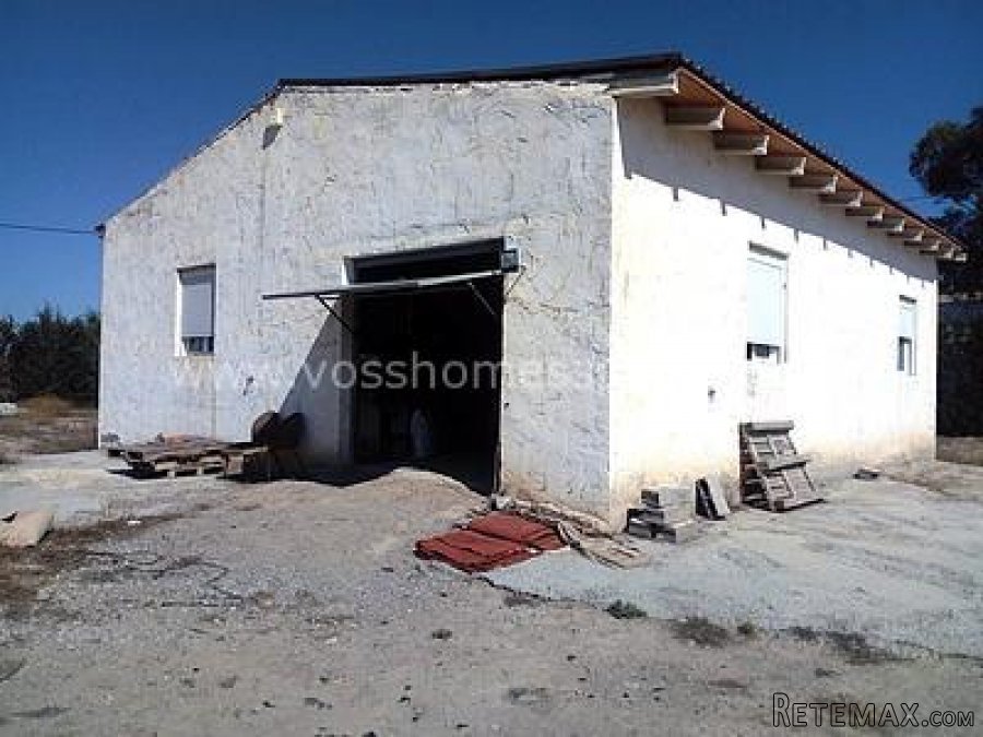 Rustic Land for sale which has a large 120m2 work shop with..