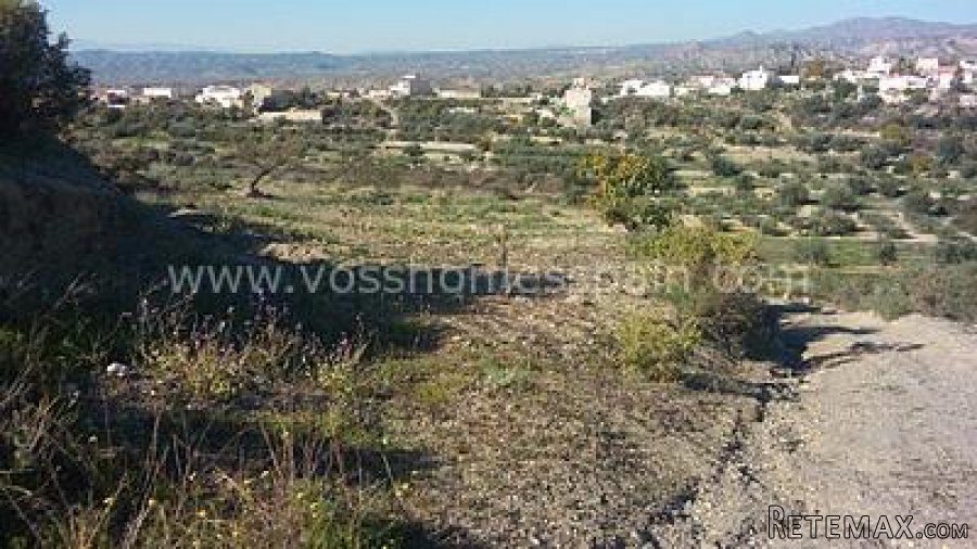 Two seperate plots of rustic land one of 3.000m2 with 1/2 a..