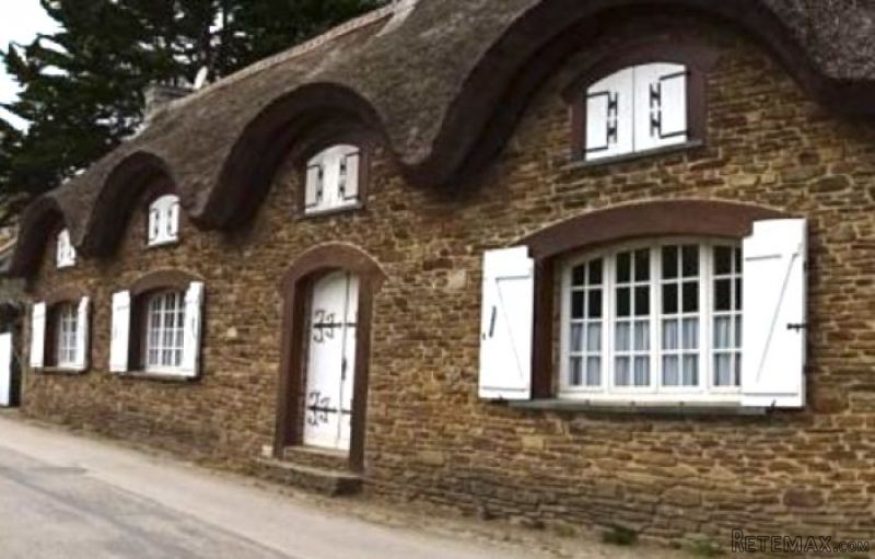Canal-side Thatched House
