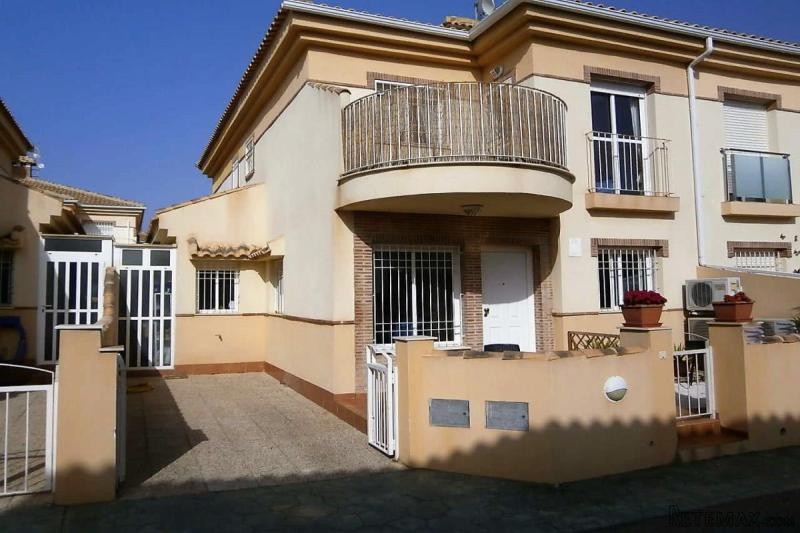 3 bedroom corner property with communal..