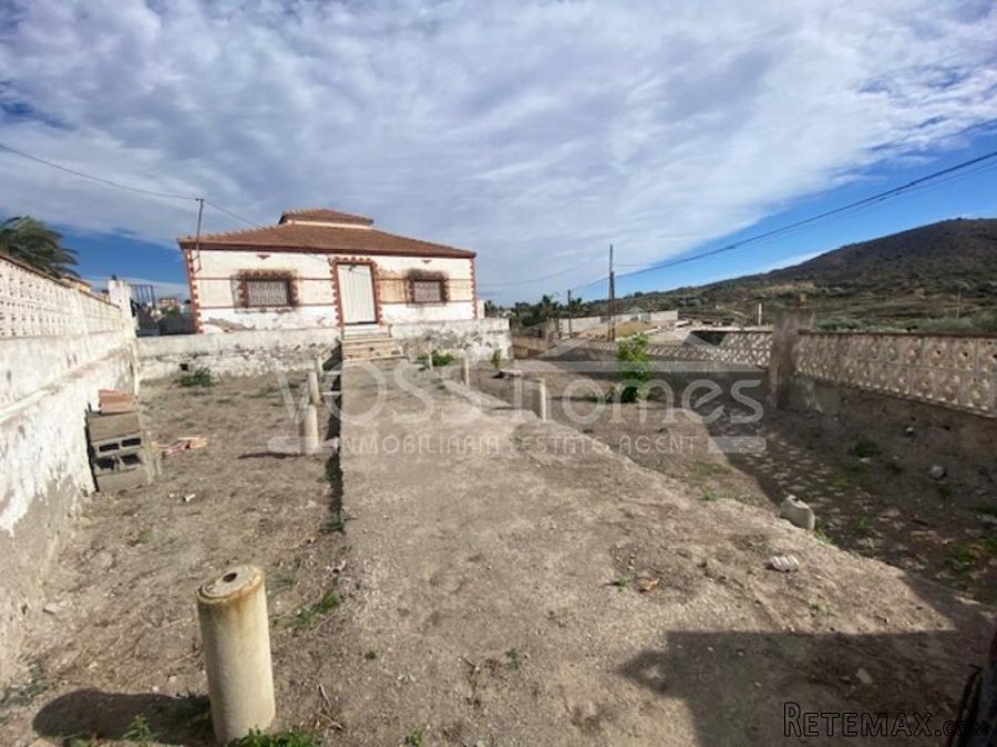 A large, detached village house with 5 bedrooms, 1 large..