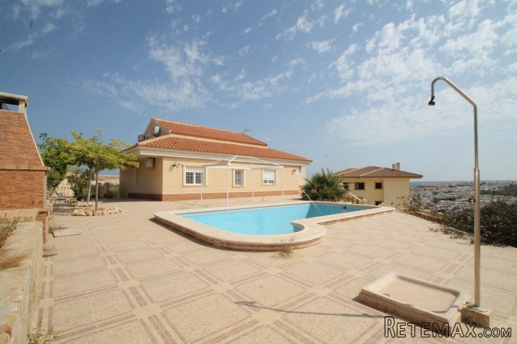 At the edge of a luxury villa district in La Marina we find..