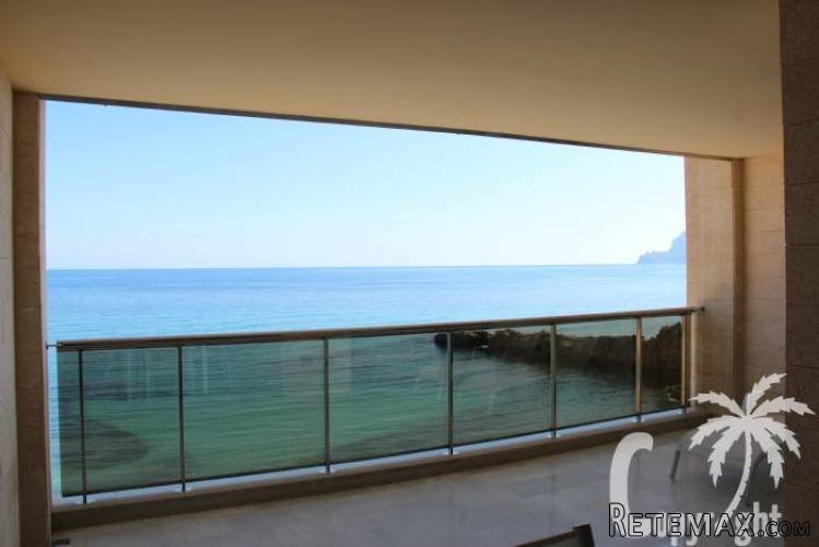 Modern frontline apartment. Very quiet beach next to luxury..